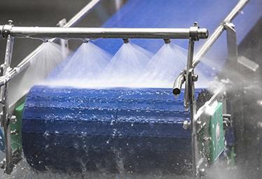 Reinigung von Förderbändern Reinigung von Förderbändern